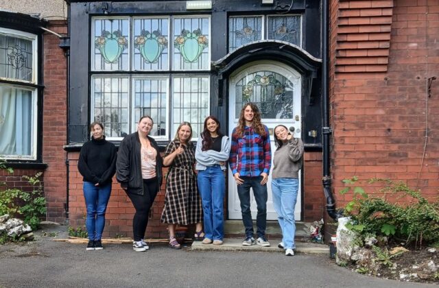 'Team Ashurst' celebrating the latest CQC inspection report in 2025.